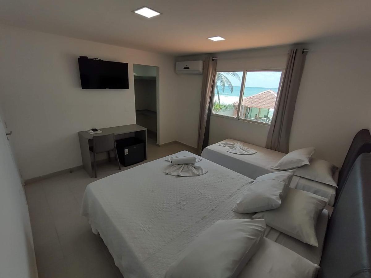 Quarto Triplo com Vista do Mar