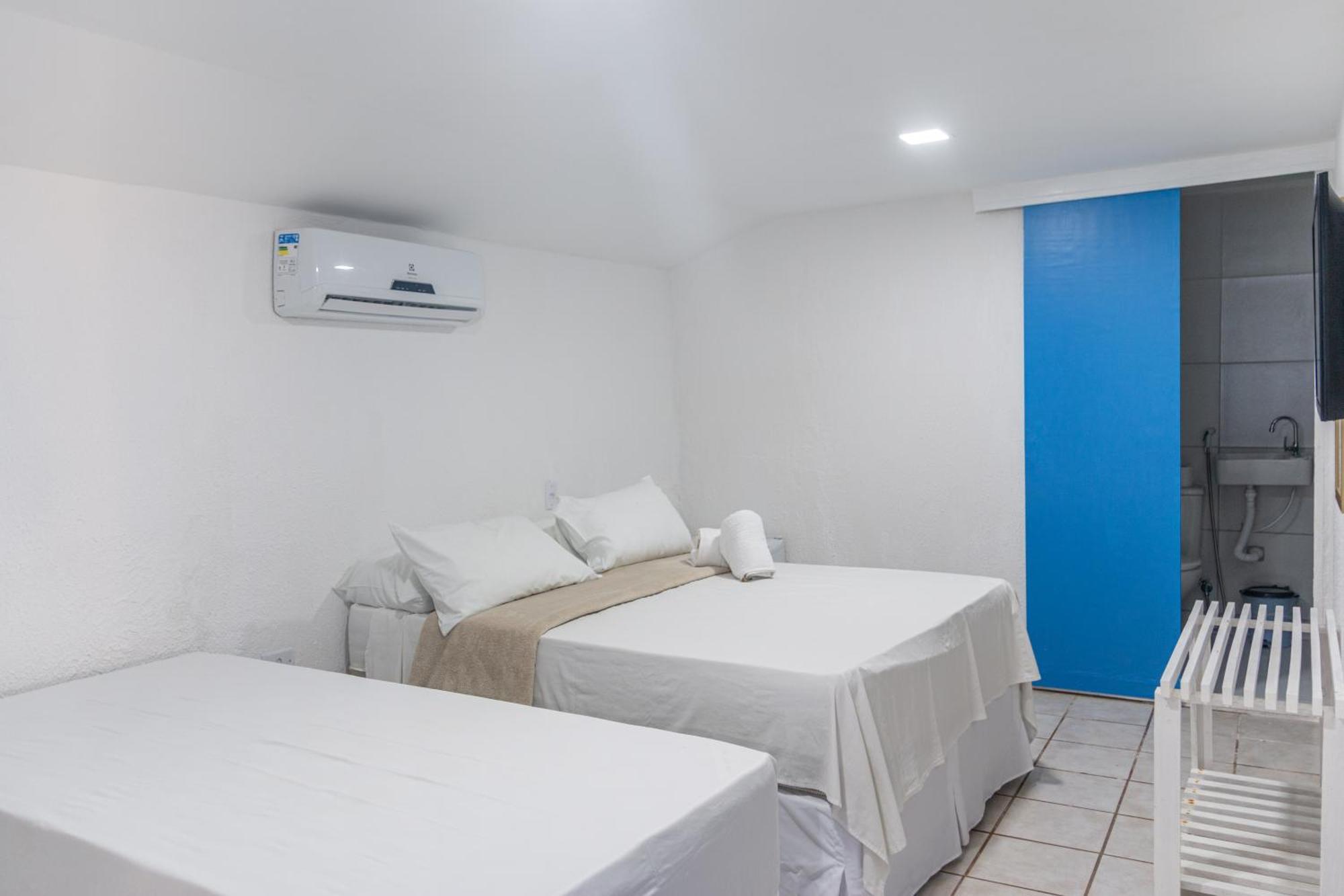 Quarto Triplo com Vista do Jardim